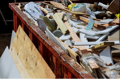 construction debris in a dumpster
